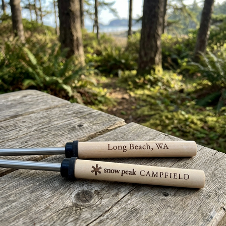 Custom laser-engraved marshmallow roasting sticks for campground stores — personalized smores sticks with destination and logo engraving